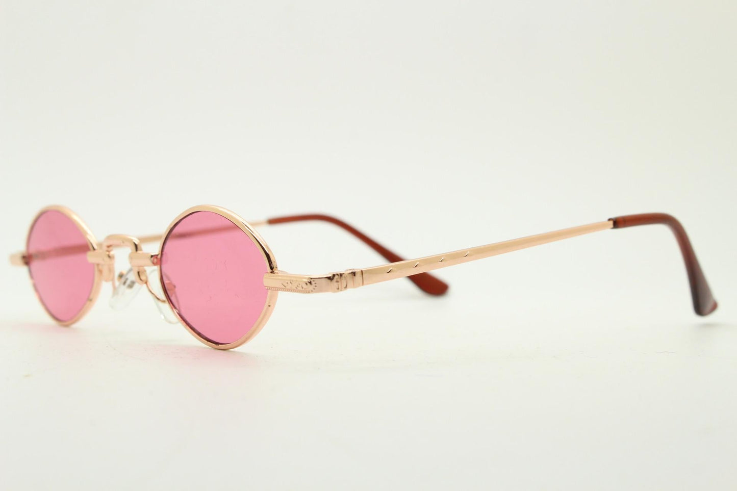 90s vintage small oval sunglasses. Imposing minimal rose gold metal victorian style frame with shocking pink lenses. Steampunk. BNWT