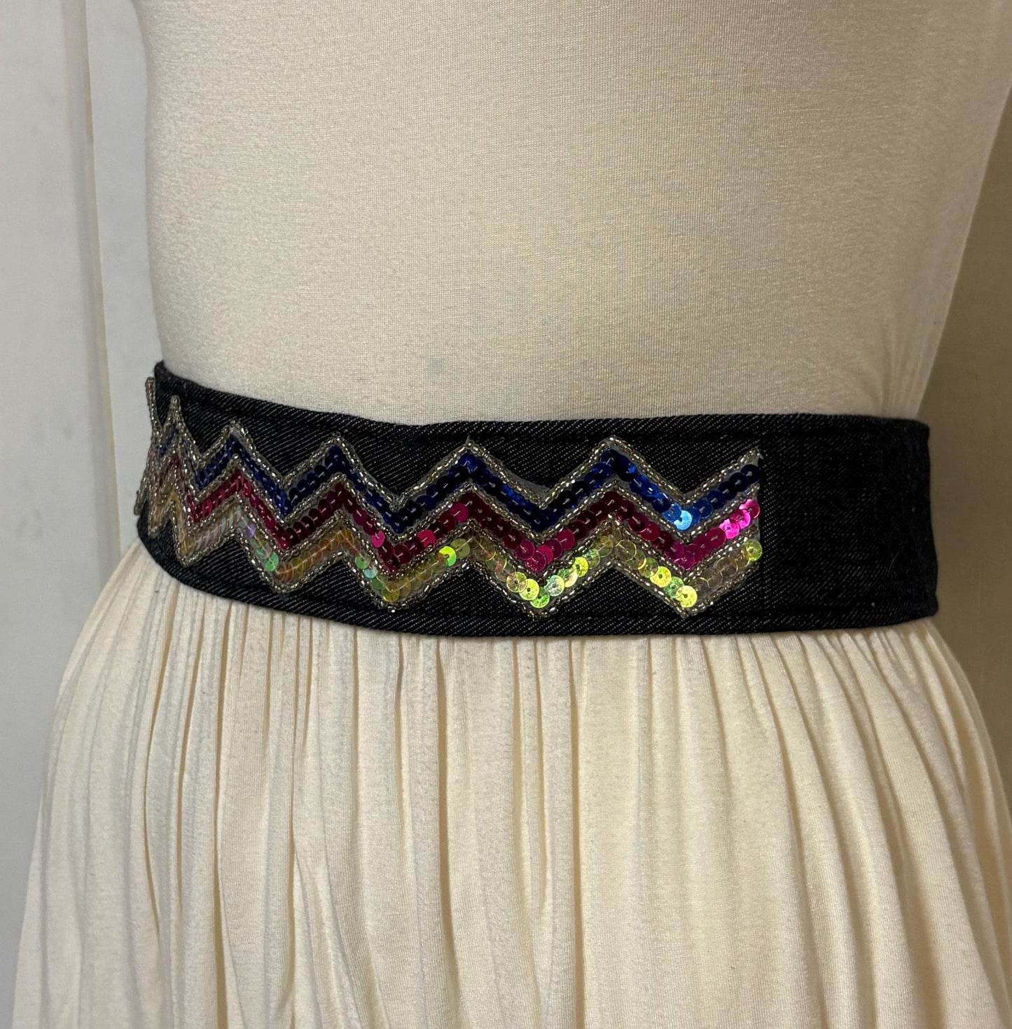 Y2K vintage womens dress belt in dark blue denim with rainbow sequins zig zag applique in neat proportions. Vegan. 2000s Unused NOS