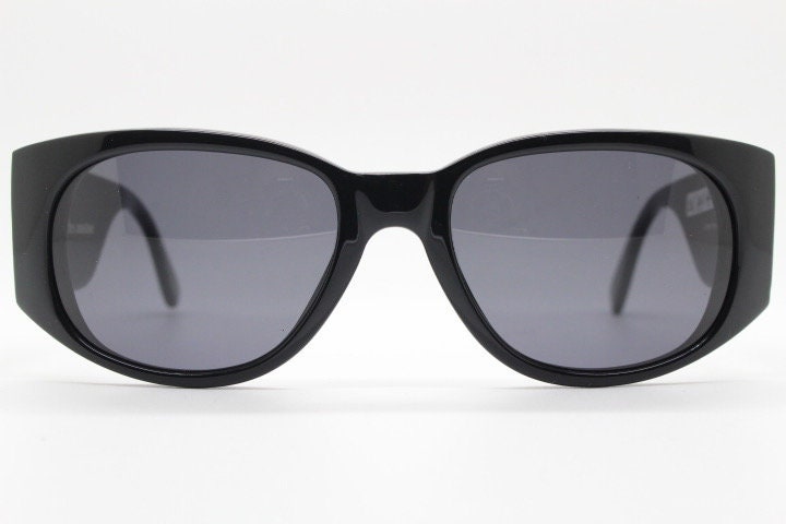 Charles Anastase for Linda Farrow Gallery sunglasses. Womens black gloss acetate  thick frame design with tall arms and swans. NOS vintage