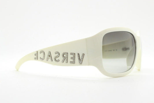 Versace Y2k vintage wrap around bug eye sunglasses. Curving white acetate shield frame with huge spell out diamante logo. 2000s. Rhinestone