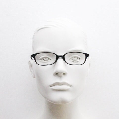 Sting 90s vintage rectangular eye glasses made in Italy. Plain black gloss low profile acetate optical frames. Prescription RX. NOS