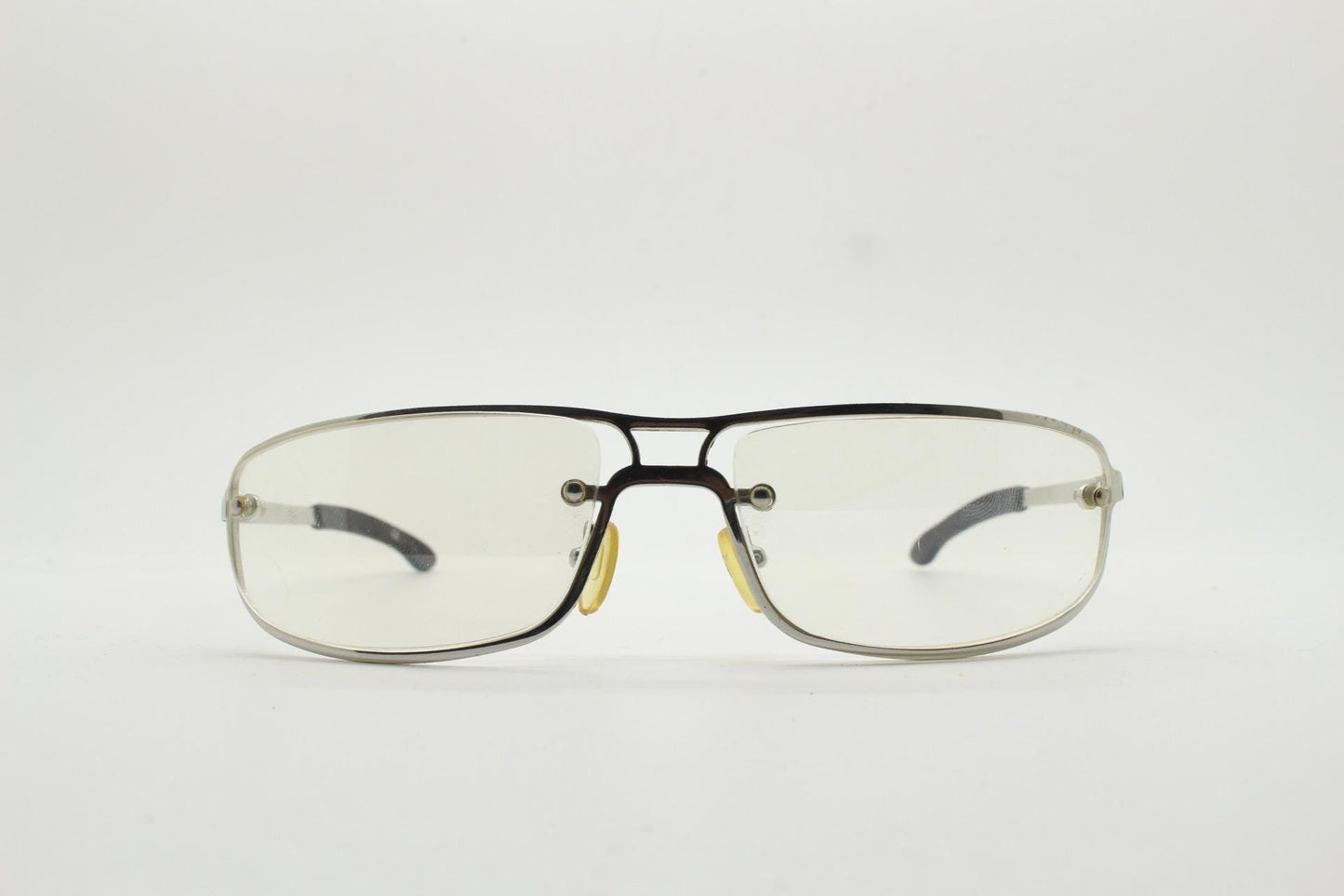 Y2K vintage rectangular aviator sunglasses. Aerodynamic racing style chrome frame  with slight mirror glazed clear lens. 2000's bug eye