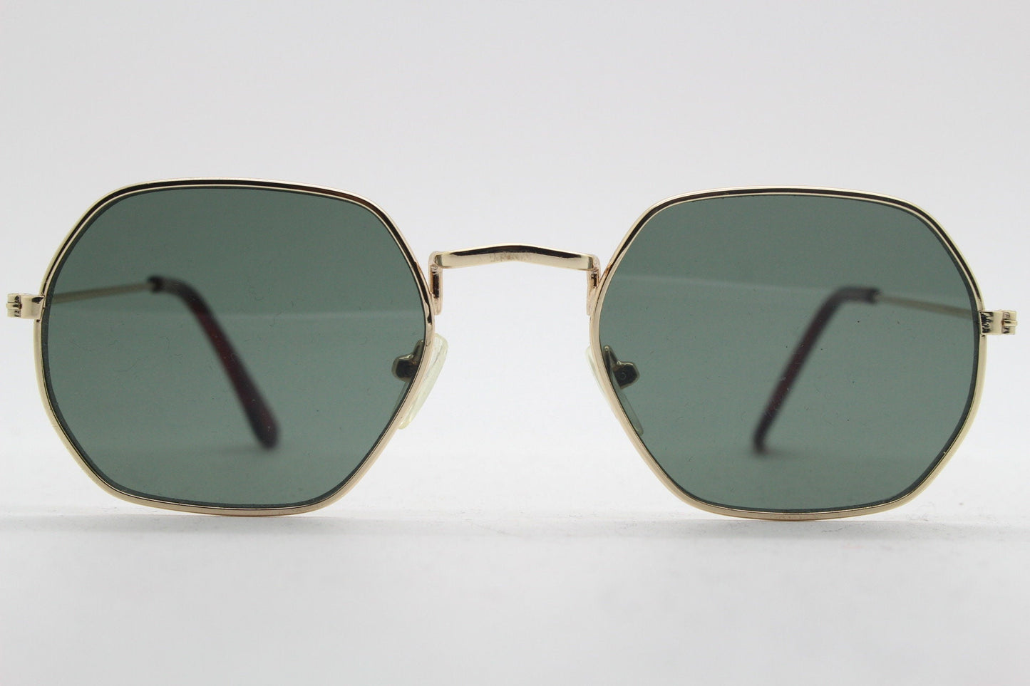 90s vintage hexagon sunglasses. Low profile slim gold 60s design frame with flat green lenses Octagon