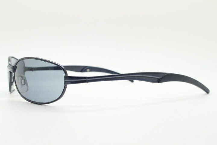 90s vintage oval small bug eye sunglasses. Curved grey satin finish solid metal frame. Rave. Steampunk. Unused NOS