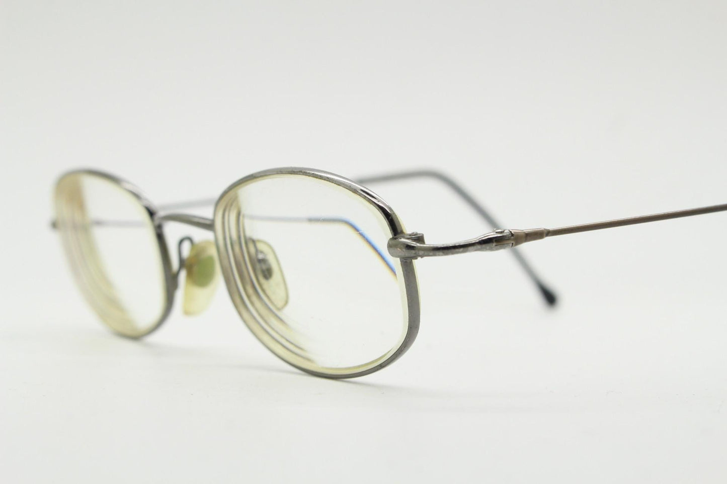 Giorgio Armani 90s vintage angular oval eye glasses made in Italy. Minimal grey chrome metal optical frame. Prescription RX spectacles