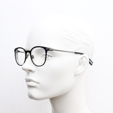 Trussardi modified cat eye glasses model VTR023. Womens flat black and gunmetal grey optical frame. Prescription. Vintage spectacles