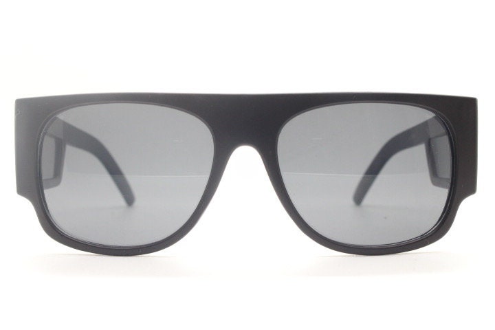 Y2K vintage rectangular side panel sunglasses. Black matt frame with grey lenses and side window spoilers / blinkers. 2000s NOS goggle