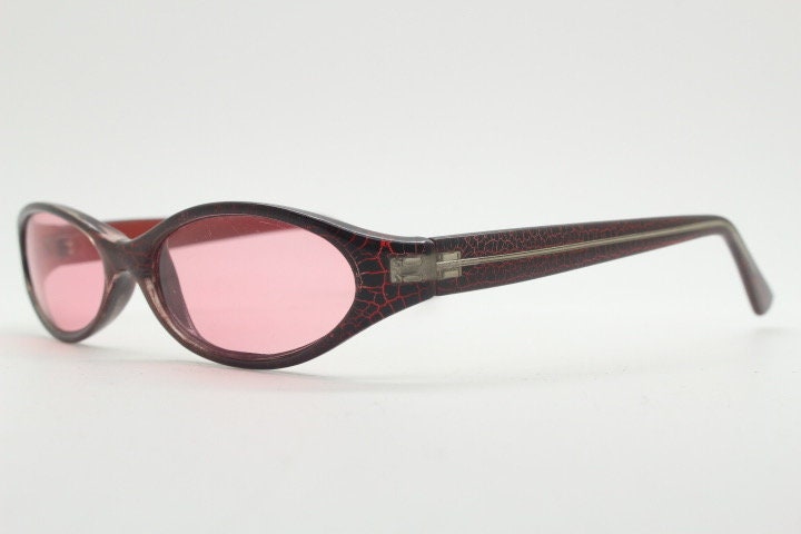 90s vintage abstract oval sunglasses. Thick curve around pink frame with psychedelic light pink lenses. Super villain mini mask. Cosplay NOS