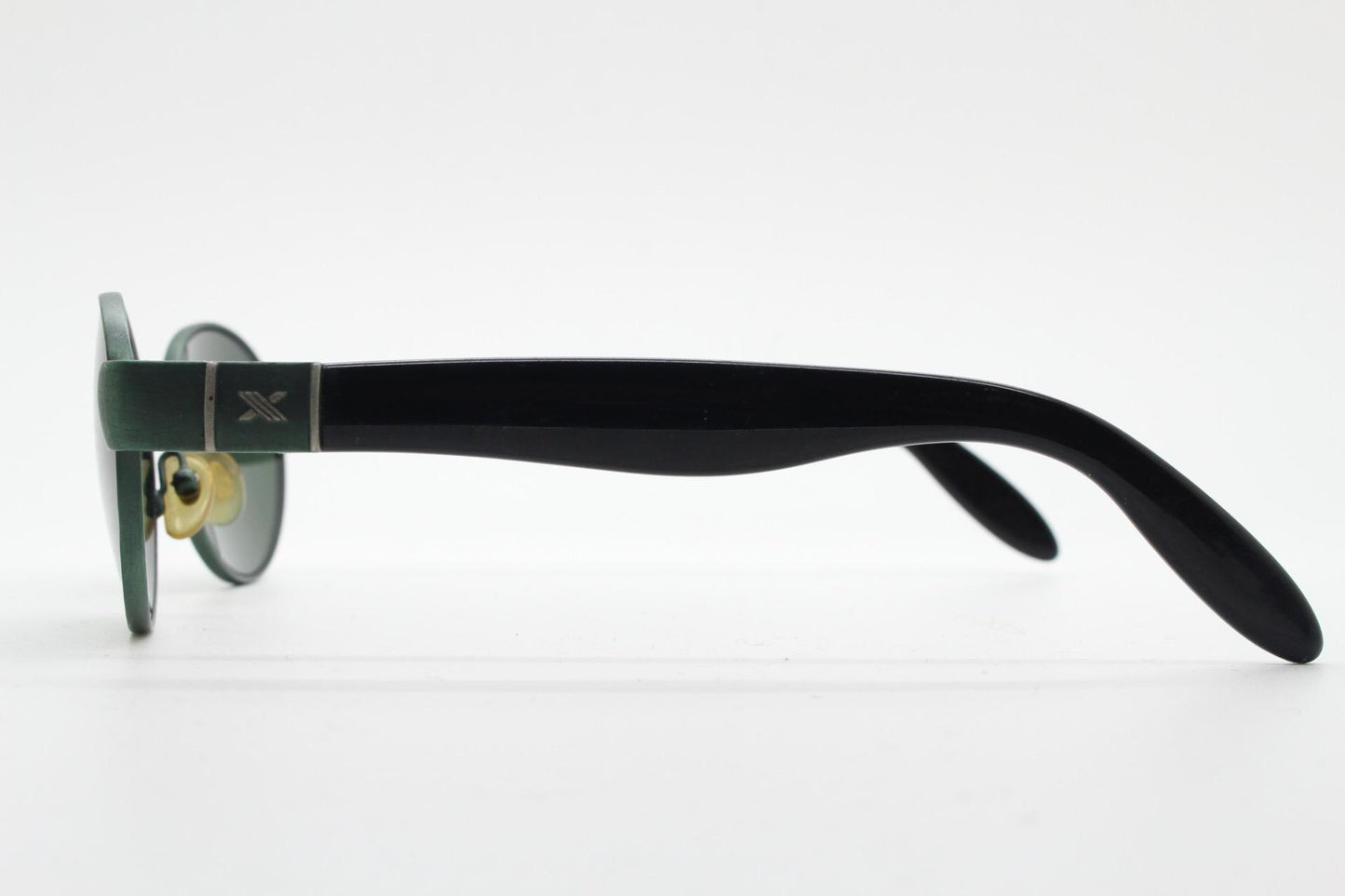 Safilo for Oxydo 90s vintage oval sunglasses made in Italy. Green matt finish solid metal frame with black arms and green lenses. Unused NOS