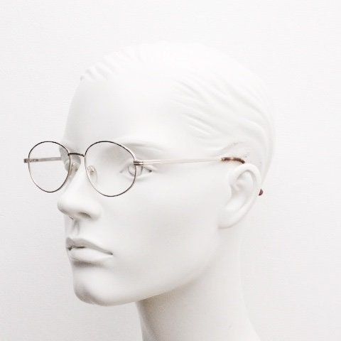 90s vintage oval eye glasses. Bright golden optical frames with coloured enamel brows. Prescription RX spectacles. Clear lens NOS
