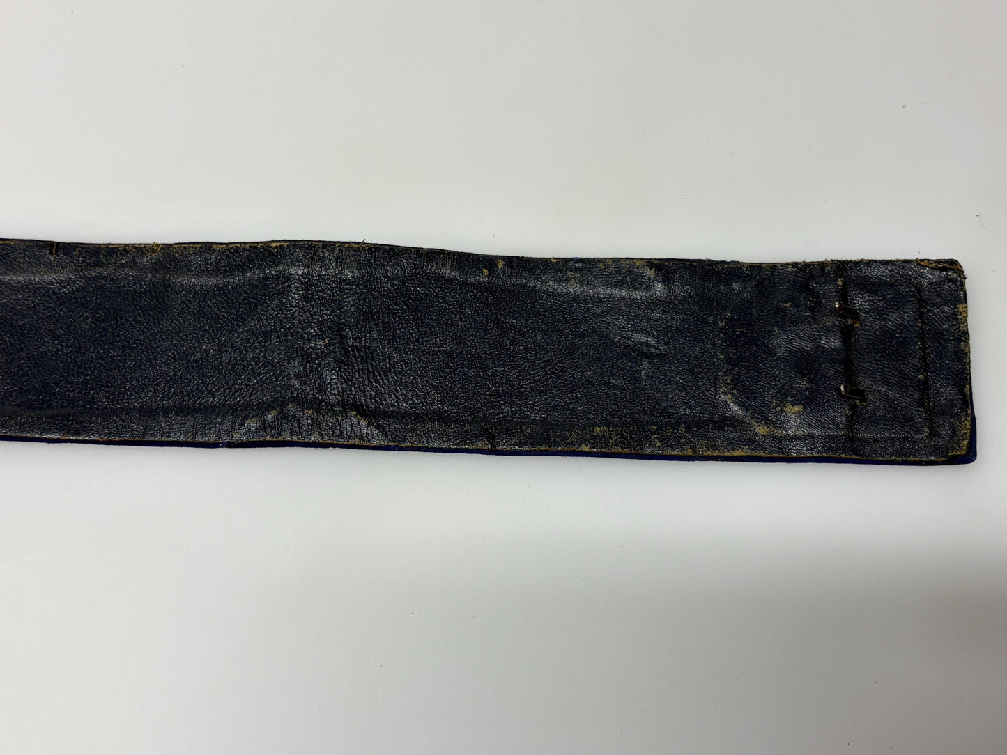 80s vintage womens hand made feature belt for a dress. Flattering V shape. Blue fabric with abstract glitter circles on a leather backing