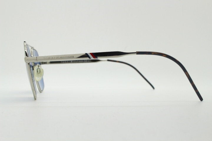 Tommy Hilfiger square aviator sunglasses with double bridge. Silver metal 6 sided frame aviators with blue lenses. Hexagon
