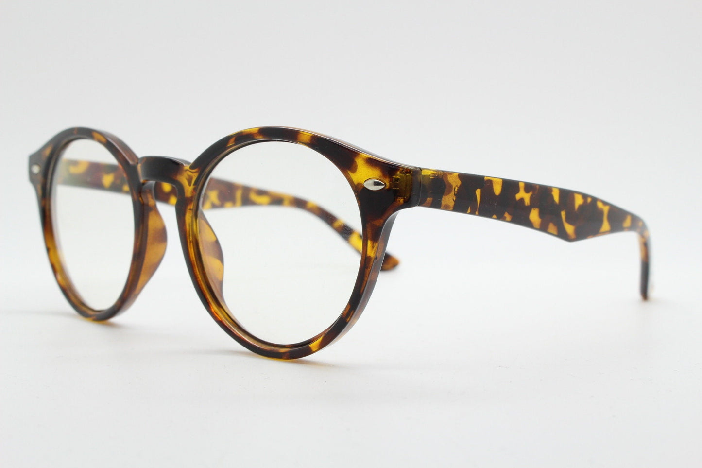 90s vintage round eye glasses. Tortoise gloss 40s design optical frame with keyhole bridge and clear lenses. Prescription RX Spectacles