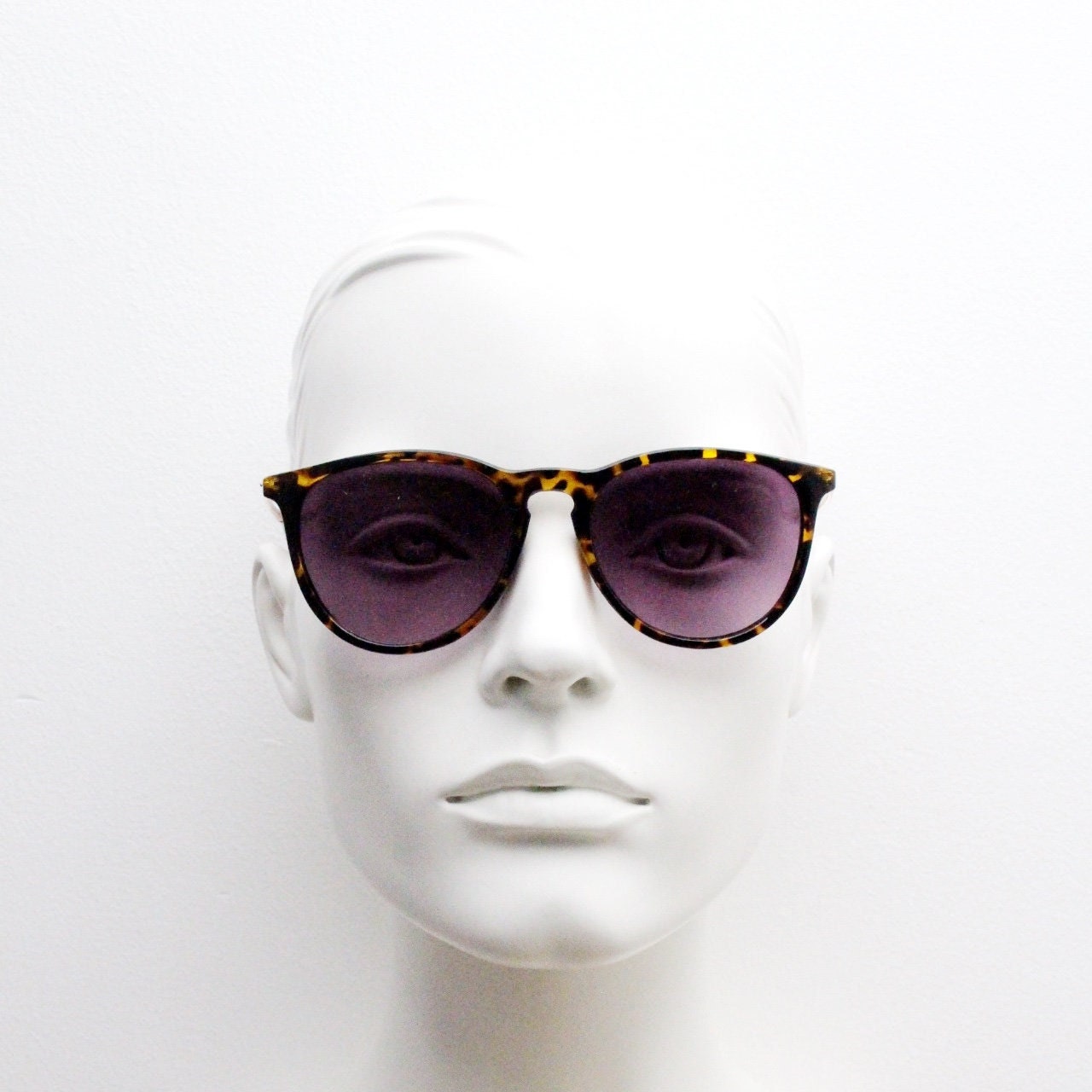 90s vintage sunglasses. Tortoise gloss frame with graduating black lenses and contrasting gold arms. Unused NOS