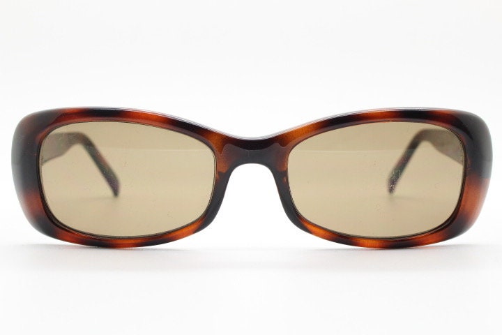 Calvin Klein 90s vintage thick framed rectangular sunglasses. Womens dark tortoise gloss low profile design.