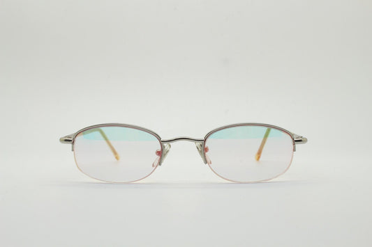 90s vintage small rectangular sunglasses. Silver chrome half frame with light tone lenses with gold mirror glaze. 2000's. Y2K. NOS micro