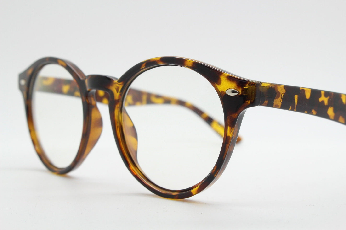 90s vintage round eye glasses. Tortoise gloss 40s design optical frame with keyhole bridge and clear lenses. Prescription RX Spectacles