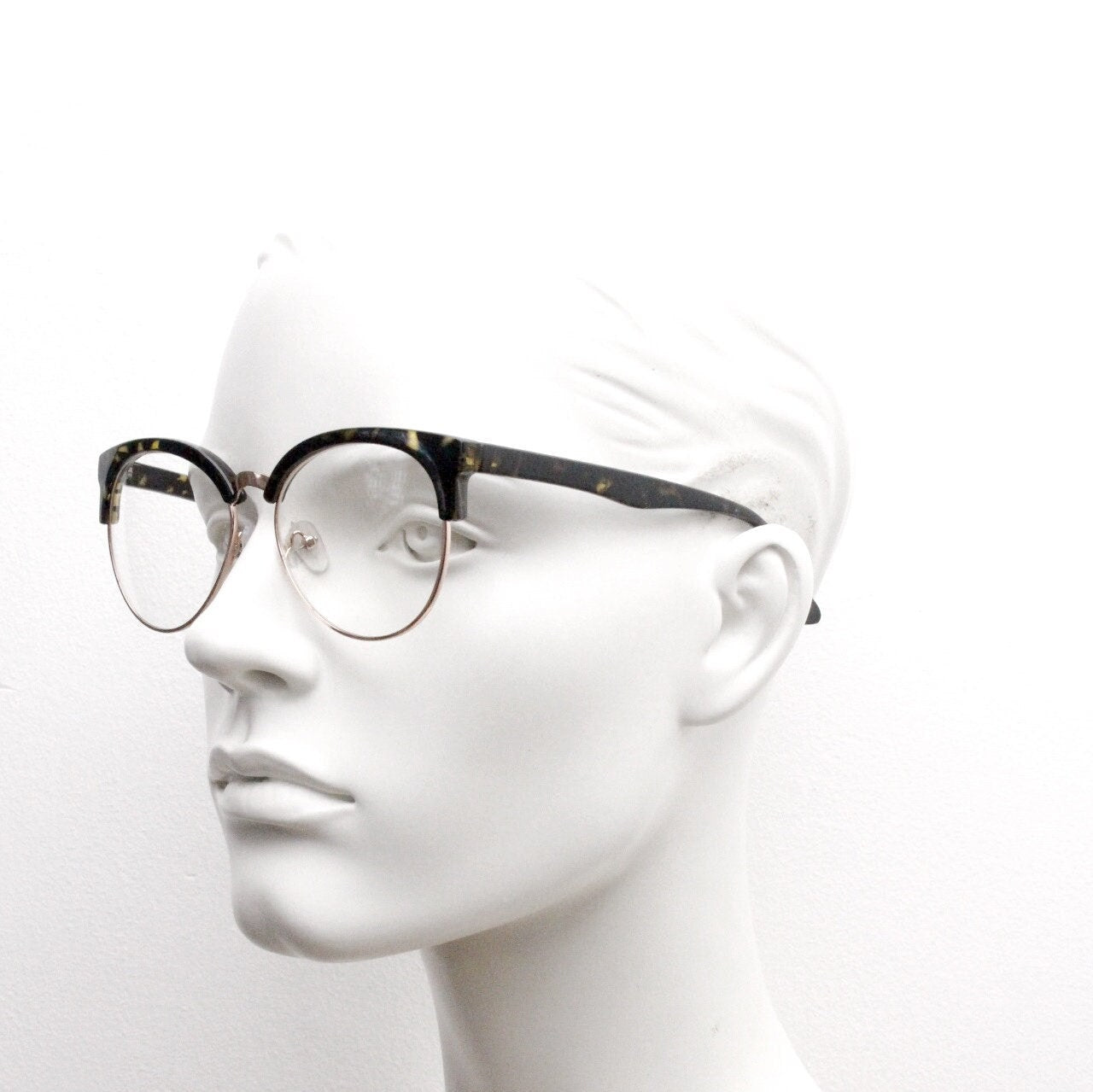 90s vintage modified cat eye glasses. Tortoise browline half frame eyeglasses with gold underwire. 50s, 60s design cateye. NOS