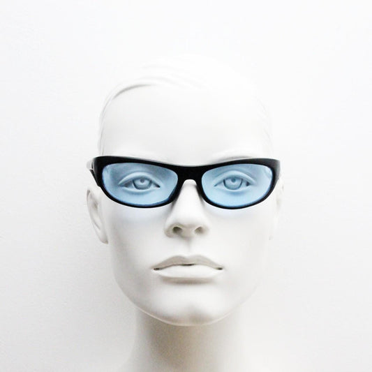 90s vintage curved wraparound sunglasses. Aerodynamic low profile black satin finish frame with light tone blue lenses. Sports shield. NOS