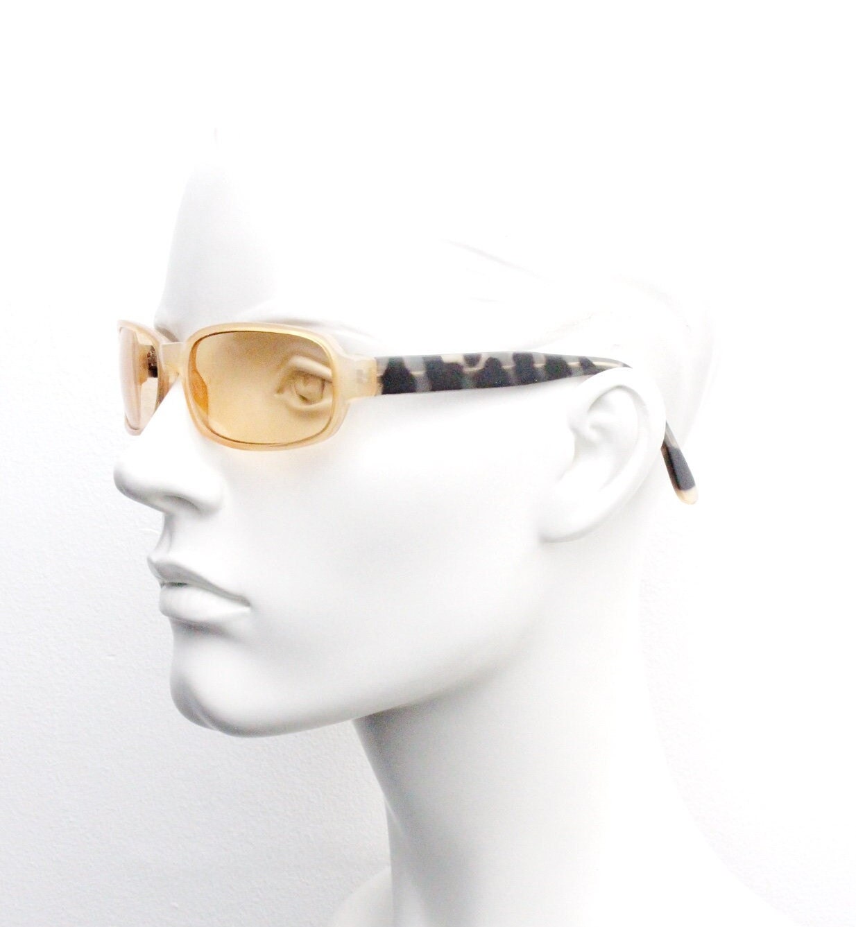 Y2K vintage curved rectangular sunglasses. Beige frame with matching lenses and contrasting tortoise arms. 2000s unused NOS. 00s