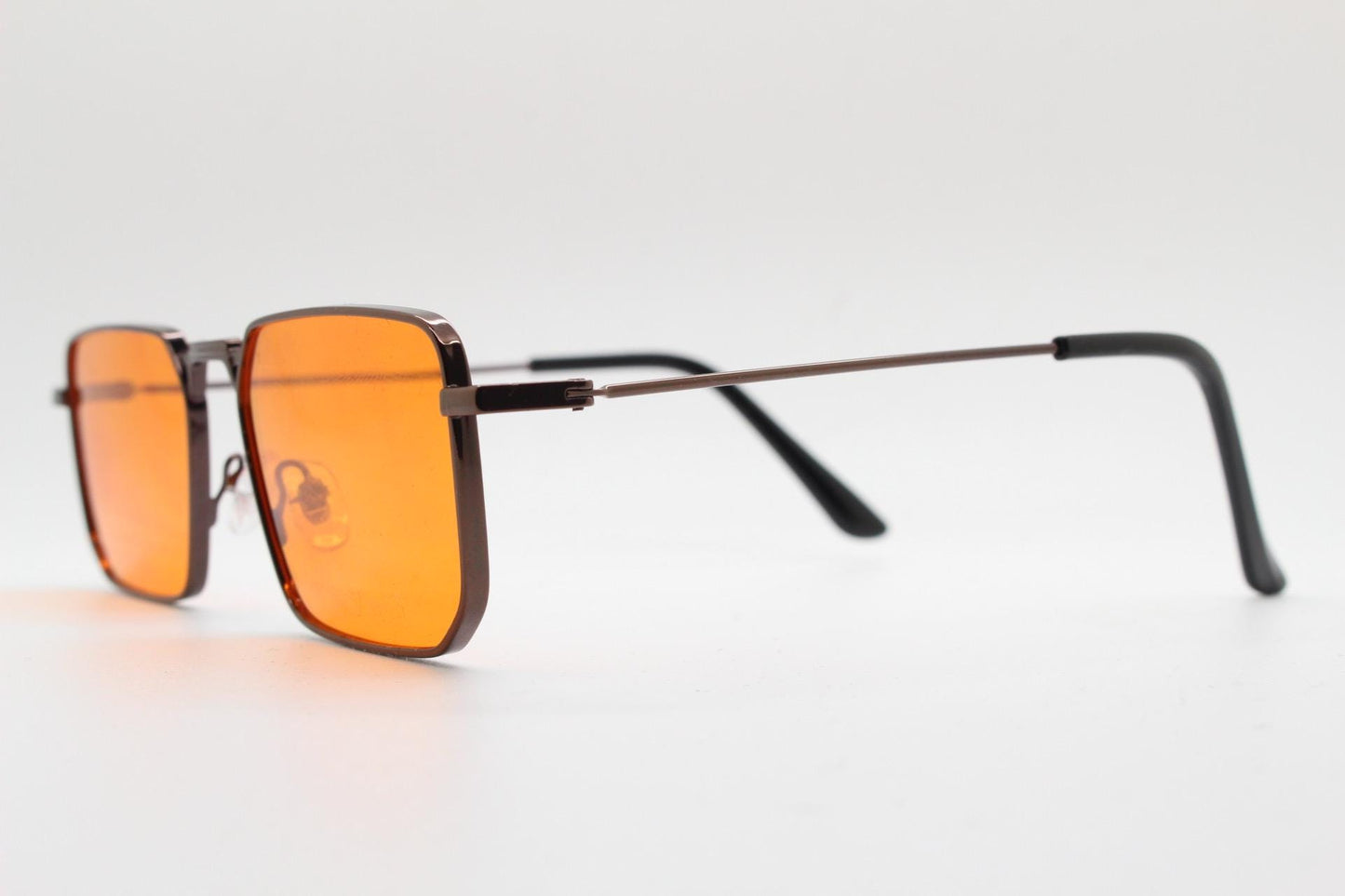 90s vintage angular 6 sided sunglasses. Brown chrome metal frame with blazing flat orange lenses. Rectangular psychedelic sunnies. BNWT