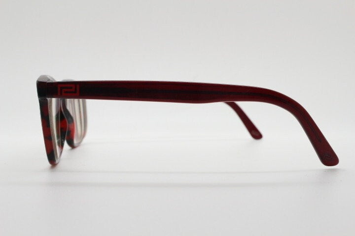 Versace modified wayfarer design eye glasses made in Italy. Mottled brown acetate optical frames with subtle logo. Prescription eyeglasses