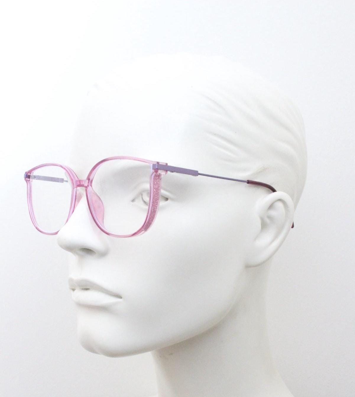 Round cat eye glasses. Transparent pink cateye optical frame with purple metal arms and eyecatching glitter sides. Vintage Prescription RX
