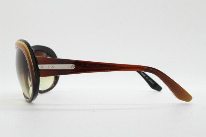 Dita oversized 70s design sunglasses model Pretender made in Japan. Gorgeous brown and black layered acetate. Womens NOS. 60s