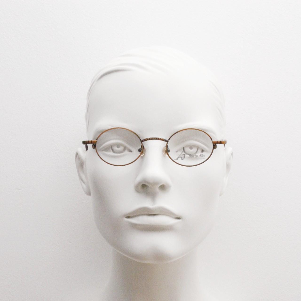 Paris Ma 90s vintage small oval eye glasses. Brushed bronze optical frames with charming arm details. Prescription. Steampunk spectacles NOS