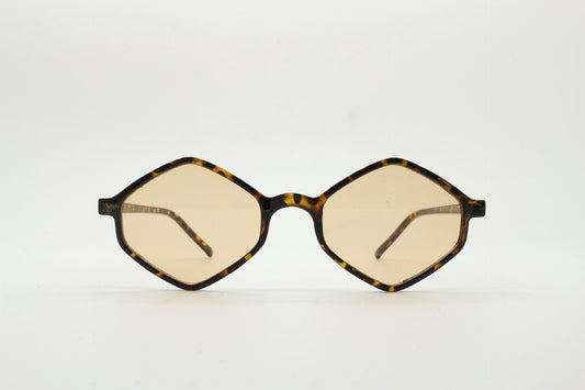 90s vintage diamond hexagon sunglasses. Atmospheric 6 sided tortoise gloss frame with very light tone brown lenses. Unused NOS