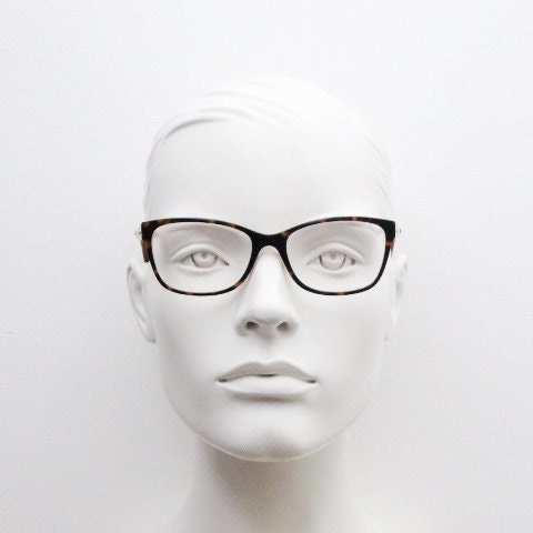 Gant vintage modified cat eye glasses model 4060. Tortoise acetate and satin metal arm cateye optical frames. Womens prescription spectacles