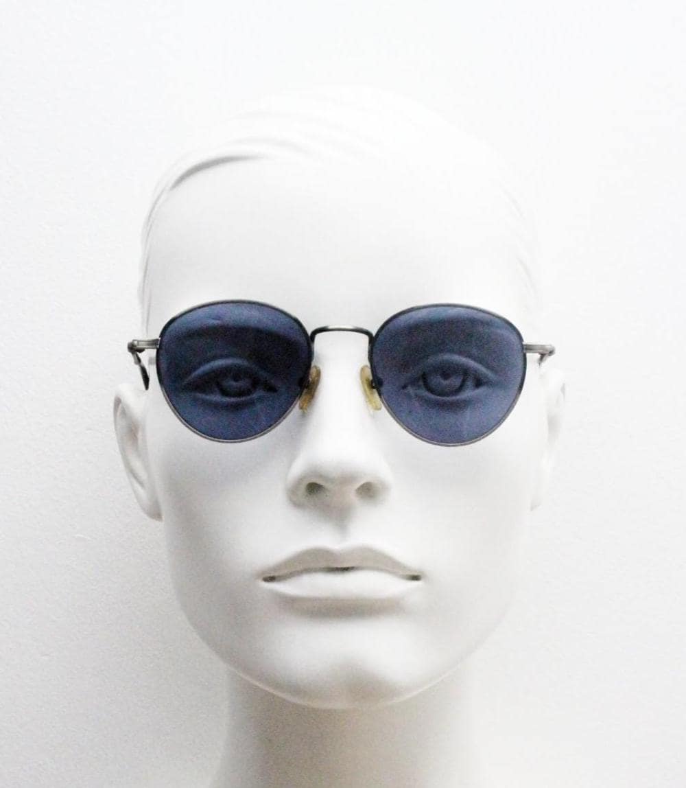 90s vintage metal oval sunglasses. Minimal brushed bronze finish brown frame with grey lenses and detailed arms. Steampunk. Panto. NOS