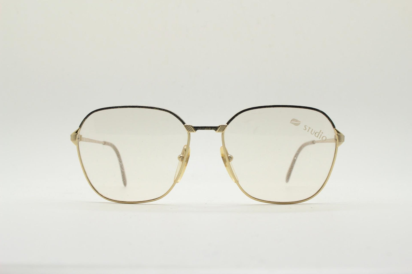 80s vintage square eye glasses made in Italy by Studio. Black and gold patterned metal optical frames in neat proportions. Unused NOS