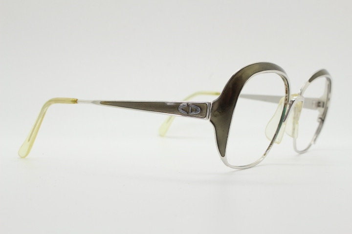 Christian Dior 70s vintage big round eye glasses made in Austria. Silver optical frame with dynamic reflective grey enamel. Prescription RX