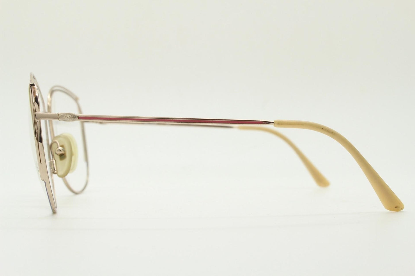 80s vintage gold metal eye glasses made in Italy by Annabella. Inventive double brow with pink highlights. Optical frame. Prescription NOS