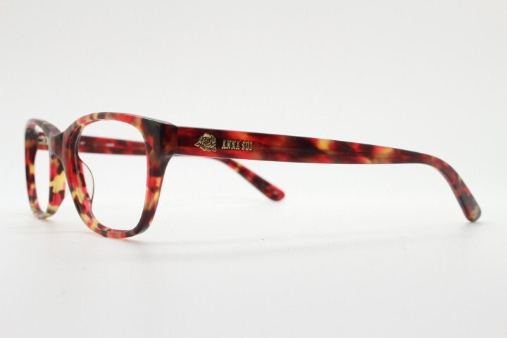 Anna Sui modified wayfarer design eye glasses. Superb marbled acetate optical frames with red tones. Prescription RX vintage eyeglasses