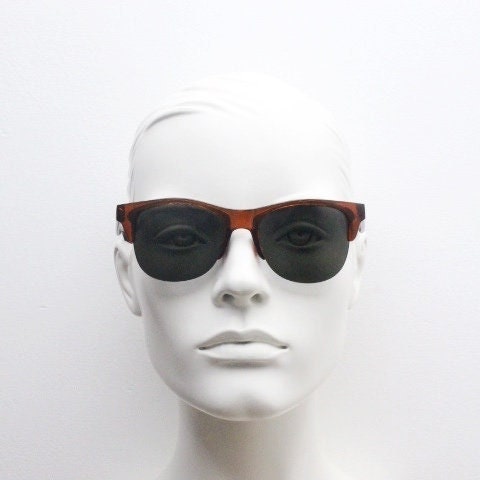 90s vintage modified wayfarer design sunglasses. Transparent brown browline half frame with brown or green interchangeable lenses . NOS