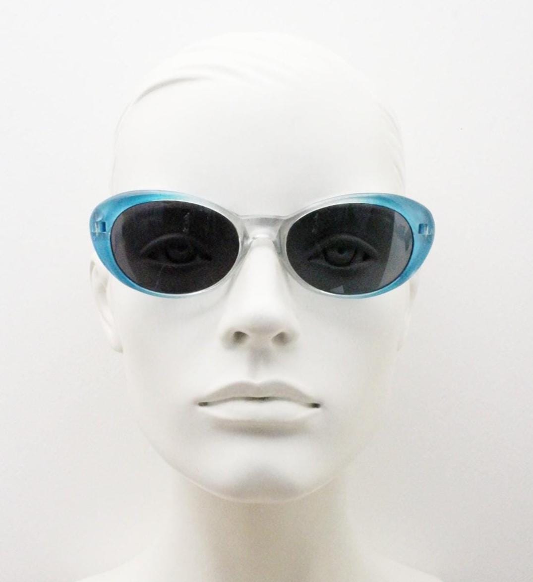 90s vintage oval cat eye sunglasses. Womens pearlised silver to aqua blue ombre fade cateye frame with contrasting dark lenses