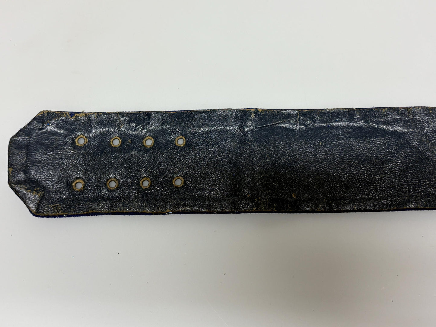 80s vintage womens hand made feature belt for a dress. Flattering V shape. Blue fabric with abstract glitter circles on a leather backing