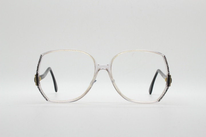Silhouette 80s vintage hexagon eye glasses made in Austria. Dynamic transparent crystal optical frame with abstract pattern. Prescription RX