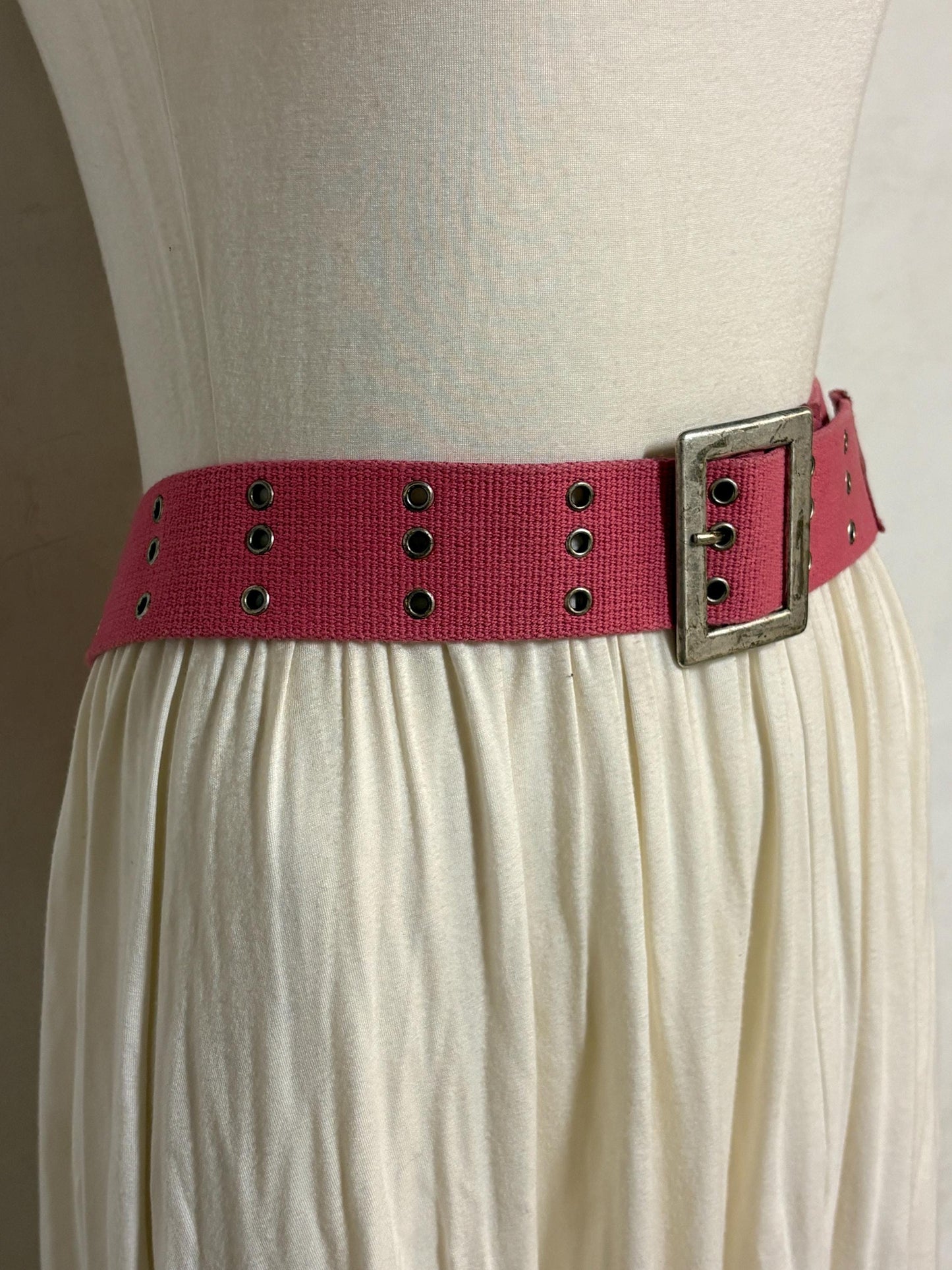 Y2k vintage thick candy pink army style belt with distressed metal buckle and 3 rows of lace holes. Statement feature / to cinch a dress
