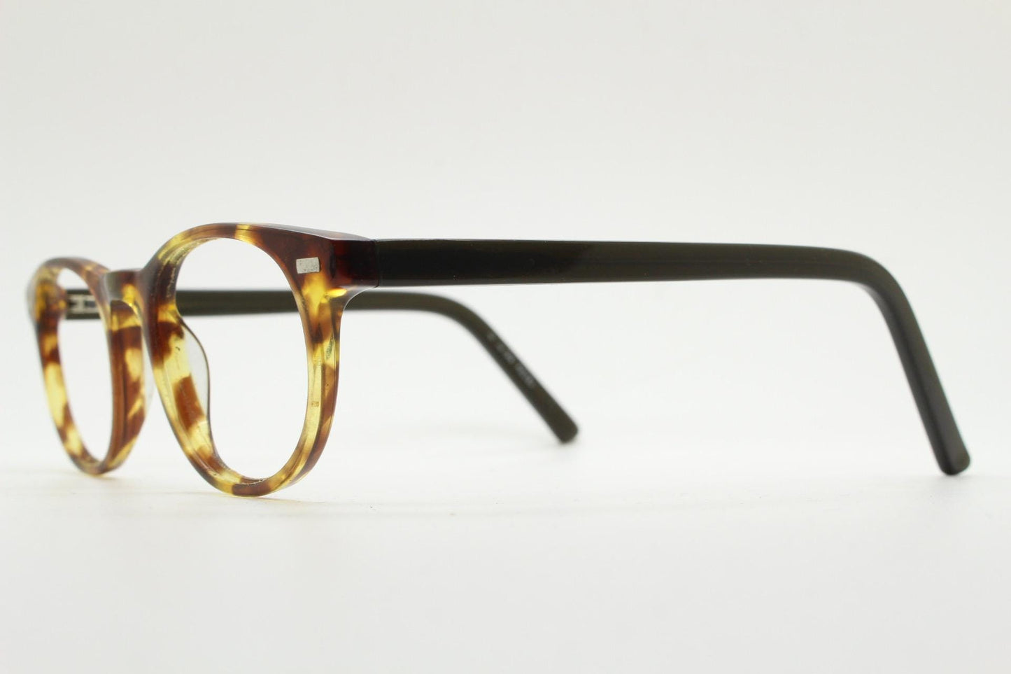 90s Vintage oval eye glasses. Tortoise gloss solid acetate 40s design optical frames with plain black arms. Prescription RX spectacles