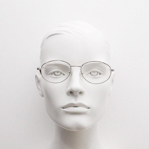 90s vintage oval eye glasses. Bright golden optical frames with coloured enamel brows. Prescription RX spectacles. Clear lens NOS