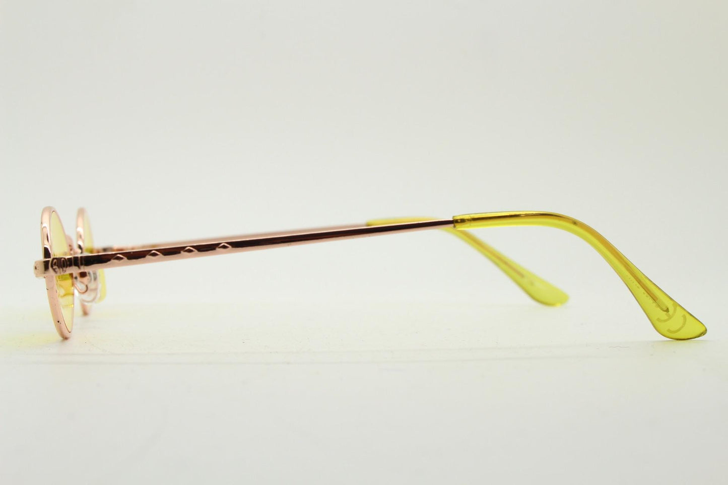 90s vintage small oval sunglasses. Imposing minimal rose gold metal victorian style frame with yellow lenses. Steampunk. BNWT