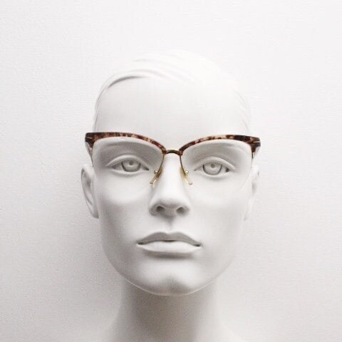 Versace 90s vintage brow line cat eye glasses made in Italy. Elegant tortoise acetate cateye optical half frames. Prescription RX eyeglasses