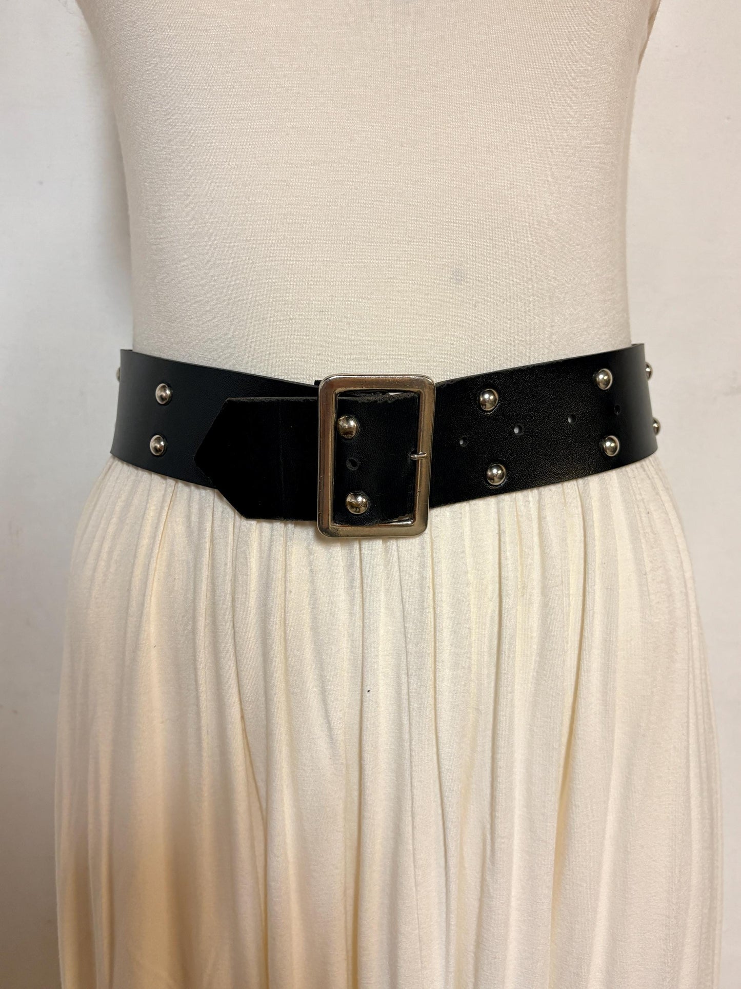 Y2k vintage womens dress belt with flat silver buckle and 2 rows of round domed metal studs. Thick black vinyl 2000s NOS