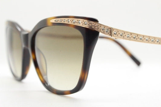 Borsalino cat eye sunglasses made in Italy model 250. Womens Tortoise acetate frame with dramatic diamante golden arms. Rhinestone cateye