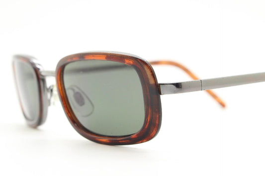90s vintage rectangular sunglasses. Grey chrome metal frame with protruding tortoise insets, matching ear bends and green lenses