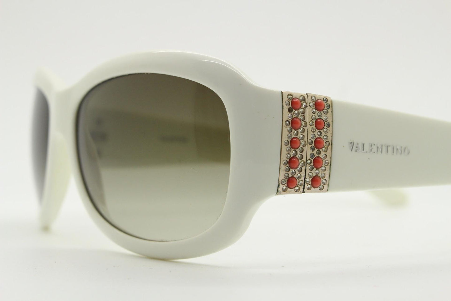Valentino Y2k vintage wrap around bug eye sunglasses. Curving white acetate shield frame with orange and diamante stones. 2000s. Rhinestone