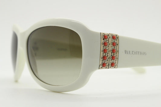 Valentino Y2k vintage wrap around bug eye sunglasses. Curving white acetate shield frame with orange and diamante stones. 2000s. Rhinestone